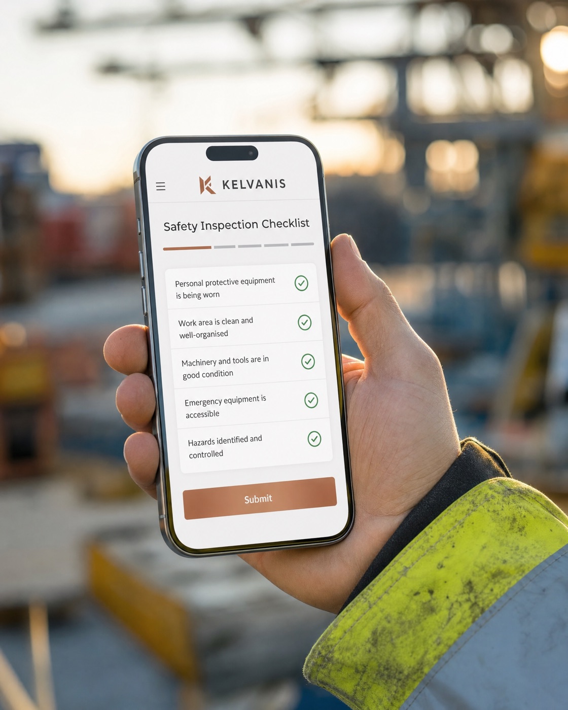 Kelvanis Hub on a phone at an industrial site